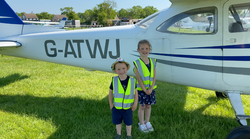 Kids at the plane